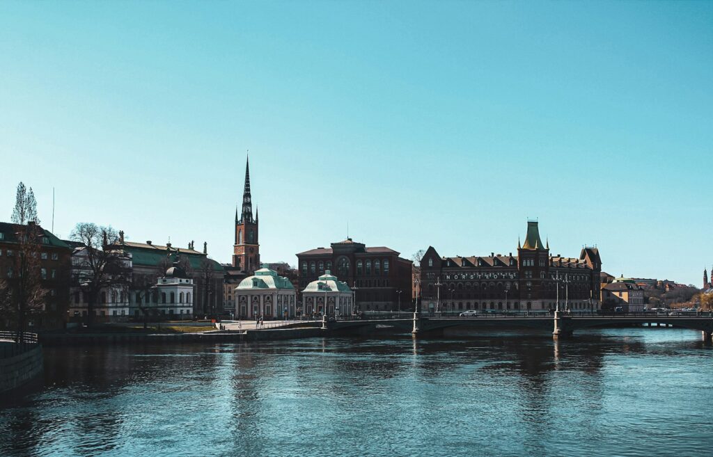 body of water near buildings during daytime