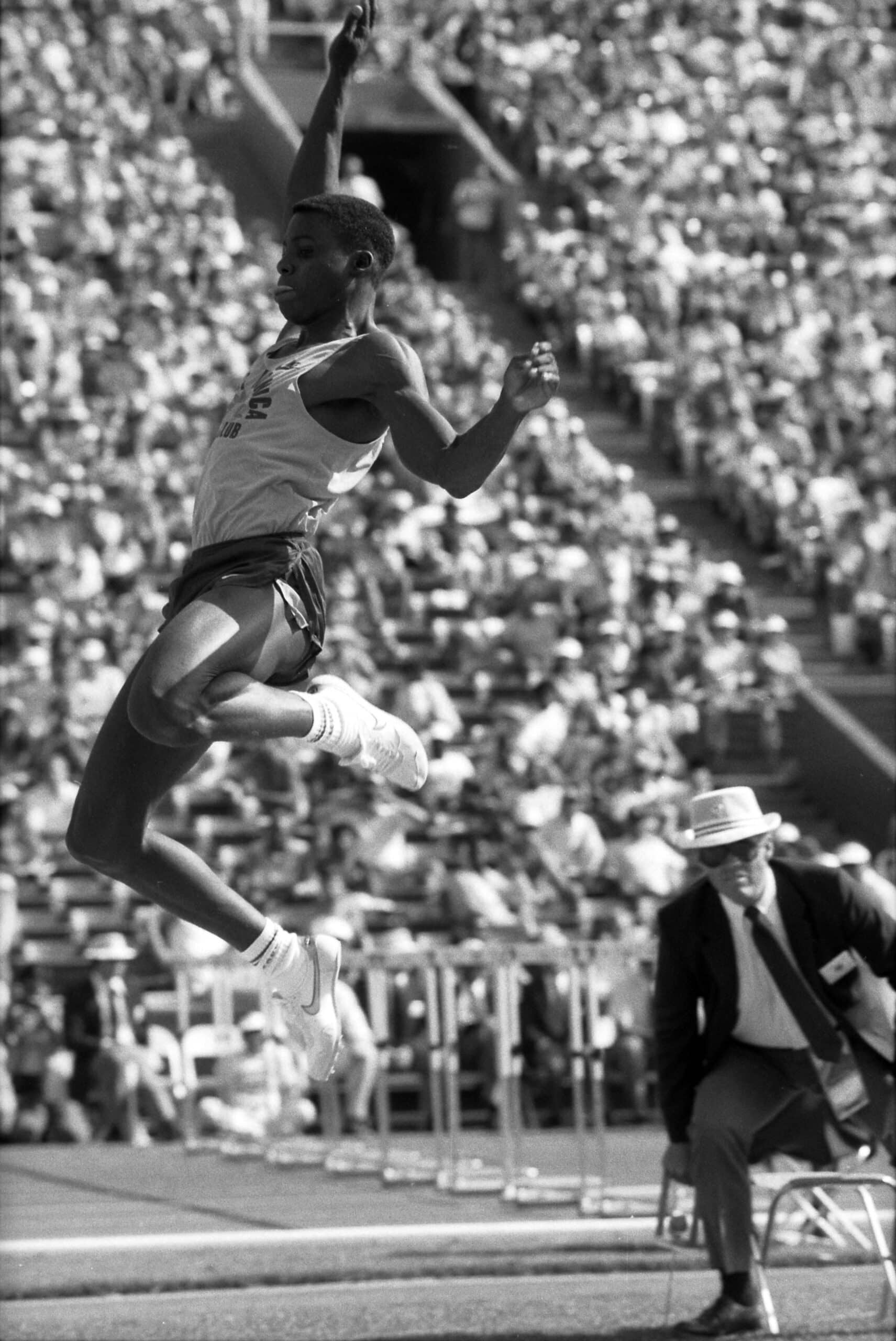 Carl Lewis mid leap at the 1984 U.S. Olympic trials scaled